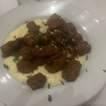Sassafras Southern Bistro - Hot & Spicy Fried Pork Tenderloin The grits is creamy and cheesy Perfect combo - Southern Near Me - Greenville, South Carolina Sassafras Southern Bistro - Hot & Spicy Fried Pork Tenderloin The grits is creamy and cheesy Perfect combo - Southern Near Me - Greenville, South Carolina
