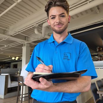 Six & Sky Rooftop Grille - My server Zach as he takes my order. He had a wonderful personality and provided exceptional customer service. - Steakhouses Near Me - Roanoke, Virginia