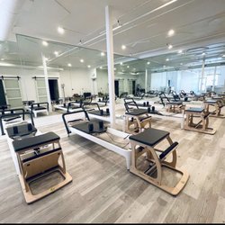 PeloDog Pilates + Cycle + Shoppe - Easy to use Reformers in a bright clean space!