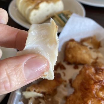 Sam's Chowder House - Piece of pollack fish from Fish and Chips - Seafood Near Me - Half Moon Bay, California Sam's Chowder House - Piece of pollack fish from Fish and Chips - Seafood Near Me - Half Moon Bay, California