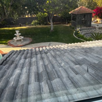 Monarch Roofing - View of tiles from upstairs window (the black mark on the right is a mark on the window)- this is the eagle Malibu tile - Roofing Near Me - Orange, California