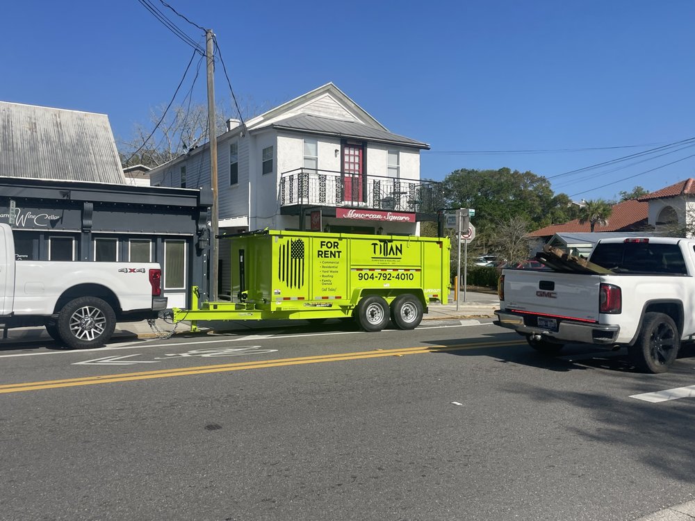 Slide of Titan Dumpsters and Hauling