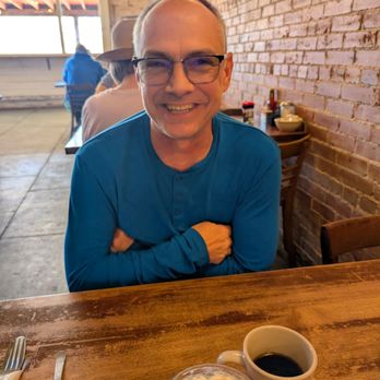 Upper Park Cafe - Front of photo - Left: Caramel iced macchiato; Right: Pecan Coffee - New American Near Me - Aubrey, Texas