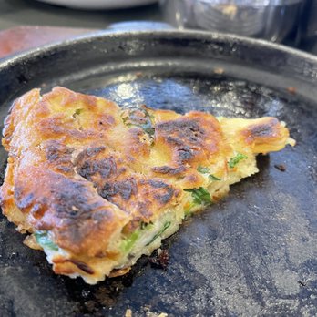 Tofu Plus - Haemul Pajeon - Seafood pancake (what's left of it :) - Korean Near Me - Cupertino, California Tofu Plus - Haemul Pajeon - Seafood pancake (what's left of it :) - Korean Near Me - Cupertino, California