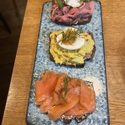 Ekte - Salmon, curried herring, and bøf (beef) smørrebrød