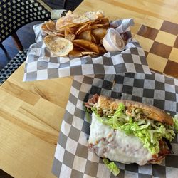 Memphis Chess Club - Half muffuletta and house made chips