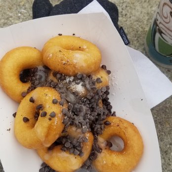 DowntownDC Holiday Market - Migue's mini donuts. They come plain and you can add all the toppings (self-serve toppings area!) - Shopping Centers Near Me - Washington, DC, District of Columbia DowntownDC Holiday Market - Migue's mini donuts. They come plain and you can add all the toppings (self-serve toppings area!) - Shopping Centers Near Me - Washington, DC, District of Columbia