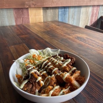 Sacred Eats - a bowl of food on a wooden table - Breweries Near Me - Kalispell, Montana Sacred Eats - a bowl of food on a wooden table - Breweries Near Me - Kalispell, Montana