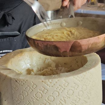 Porto By Antonio - Pasta added to cheese bowl - Italian Near Me - North Bergen, New Jersey Porto By Antonio - Pasta added to cheese bowl - Italian Near Me - North Bergen, New Jersey