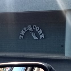 Cork Liquors - One of the signs is on the side of the building.