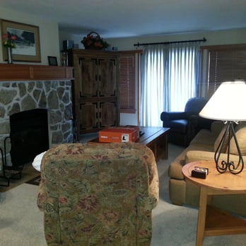 Snowbird Condominiums - 107 living room w balcony and fireplace and view of Canyon Lodge - Condominiums Near Me - Mammoth Lakes, California Snowbird Condominiums - 107 living room w balcony and fireplace and view of Canyon Lodge - Condominiums Near Me - Mammoth Lakes, California
