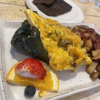 Egg - Pablano pepper stuffed with eggs, cheese and chorizo, side of scrapple - Breakfast & Brunch Near Me - Rehoboth Beach, Delaware