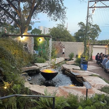 Cosmic Saltillo - Water fountain and pond with lilies gorgeous at sunset - Coffee & Tea Near Me - Austin, Texas Cosmic Saltillo - Water fountain and pond with lilies gorgeous at sunset - Coffee & Tea Near Me - Austin, Texas