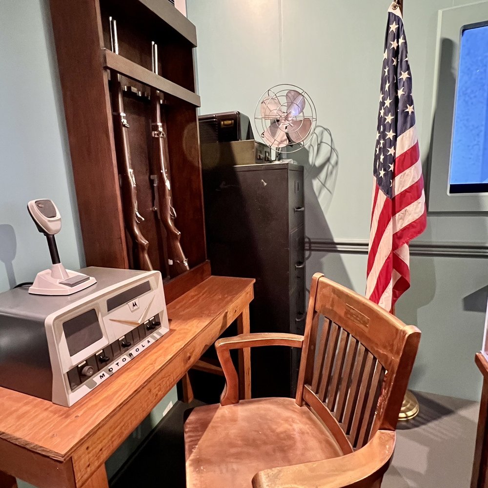 Andy Griffith Museum - Barney's chair and the gun rack - Museums Near Me - Mount Airy, North Carolina
