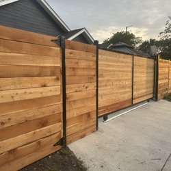 Privacy Pros Fence Company - Modern horizontal cedar fence with steel posts & automatic gate. Built strong, clean, and built to last. San Antonio, TX.