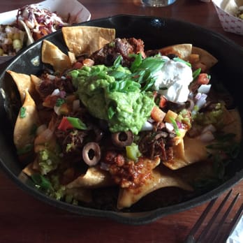 Tavern Hall - Stadium nachos with chili and pulled pork added - New American Near Me - Bellevue, Washington Tavern Hall - Stadium nachos with chili and pulled pork added - New American Near Me - Bellevue, Washington
