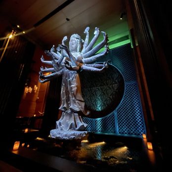 TAO Downtown Restaurant - Statue at koi pond - Pan Asian Near Me - New York, New York TAO Downtown Restaurant - Statue at koi pond - Pan Asian Near Me - New York, New York