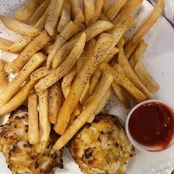 Costas Inn - Broiled crab cakes and fries - Seafood Near Me - Baltimore, Maryland Costas Inn - Broiled crab cakes and fries - Seafood Near Me - Baltimore, Maryland