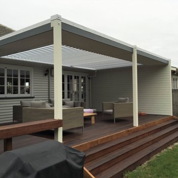 Modern Reno - Bi-level hardwood deck with built in seating. Louvered roof system with weather based automation. - Decks & Railing Near Me - Broomall, Pennsylvania Modern Reno - Bi-level hardwood deck with built in seating. Louvered roof system with weather based automation. - Decks & Railing Near Me - Broomall, Pennsylvania