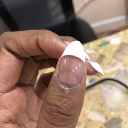 Pacific Nail Salon - There are bubbles in the manicure. Cheap top coat.