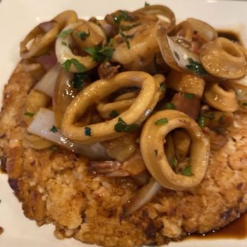 El Patio - Tacu Tacu con Saltado de Maris (Seafood mix on top of white bean/rice) - Peruvian Near Me - Cape Coral, Florida El Patio - Tacu Tacu con Saltado de Maris (Seafood mix on top of white bean/rice) - Peruvian Near Me - Cape Coral, Florida