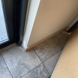 Property Resources Group Llc - Poor condition of entryways... cracked tiles, walls breaking down. Pieces of doors missing.