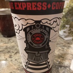 A great cup of coffee with a cute design.