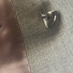 My anchor button to my double breasted jacket came back chipped/broken