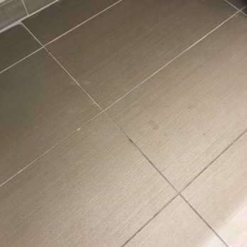 Comfort Suites - Bathroom floor that was not cleaned - Hotels Near Me - Scottsdale, Arizona