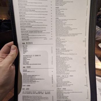 PF Chang's - a hand holding a menu - Chinese Near Me - Laval, Quebec