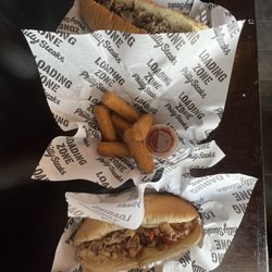 Loading Zone Philly Steaks - Large cheesesteak no onions.  Mozzarella sticks with marinara. Pepper chicken cheesesteak.