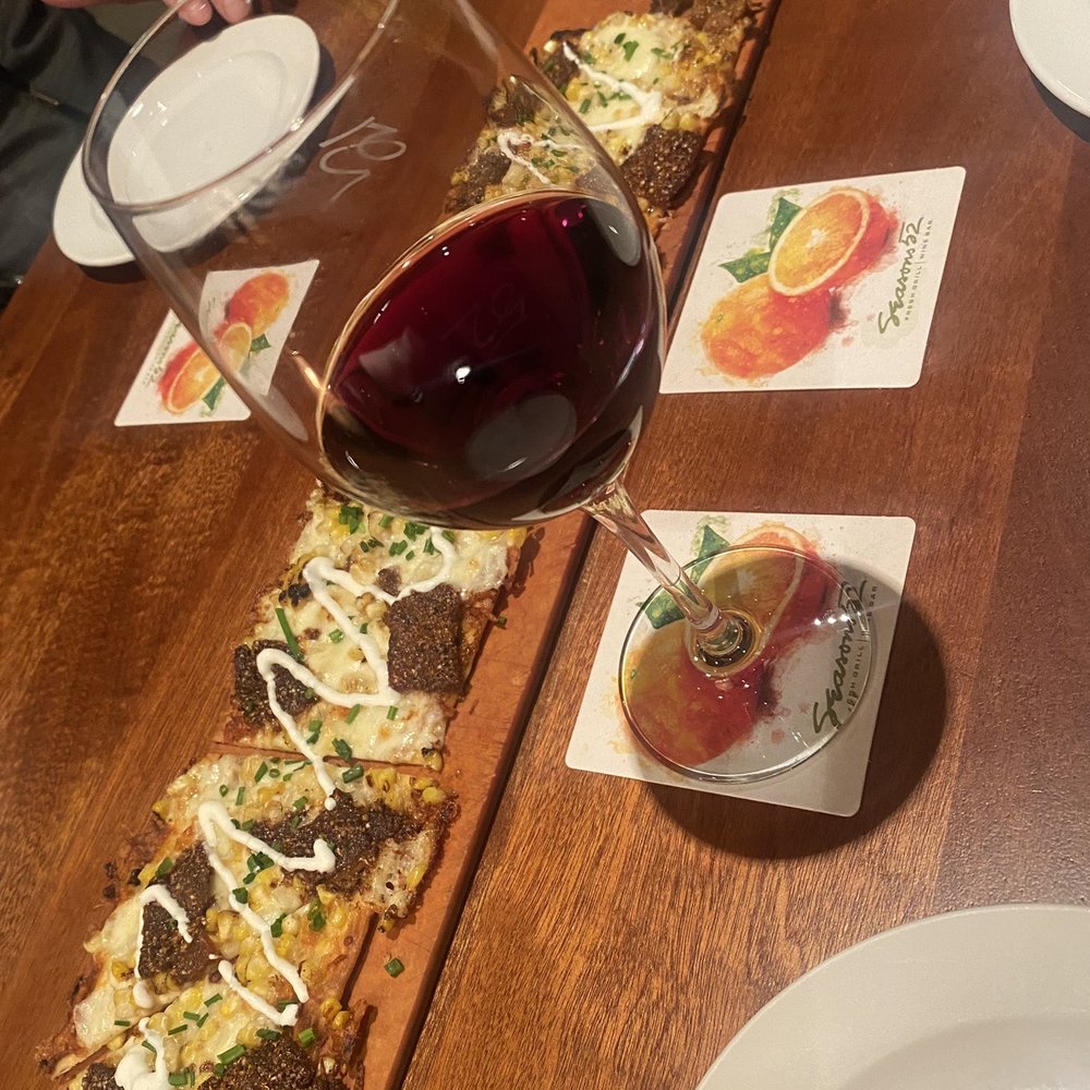 Seasons 52 - Chianti wine and corn and bacon flatbread - New American Near Me - Schaumburg, Illinois Seasons 52 - Chianti wine and corn and bacon flatbread - New American Near Me - Schaumburg, Illinois