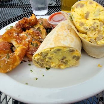 B1 Tavern - Breakfast Burrito my way stuffed with Sausage instead of Bacon, scrambled Eggs, and mixed cheeses served with salsa and redskin potatoes - Bars Near Me - Keego Harbor, Michigan B1 Tavern - Breakfast Burrito my way stuffed with Sausage instead of Bacon, scrambled Eggs, and mixed cheeses served with salsa and redskin potatoes - Bars Near Me - Keego Harbor, Michigan