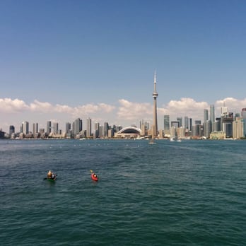 Centre Island - Picture of toronto from the ferry with some little canoers - Parks Near Me - Toronto, Ontario