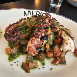 Grilled octopus, substituted fregula sarda for the chefs recommendation.. which turned out to be medley of tomatoes and pesto. Grilled octopus, substituted fregula sarda for the chefs recommendation.. which turned out to be medley of tomatoes and pesto.