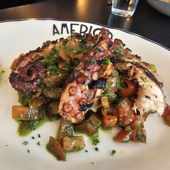 Bistro Amerigo - Grilled octopus, substituted fregula sarda for the chefs recommendation.. which turned out to be medley of tomatoes and pesto. - Italian Near Me - Montreal, Quebec Bistro Amerigo - Grilled octopus, substituted fregula sarda for the chefs recommendation.. which turned out to be medley of tomatoes and pesto. - Italian Near Me - Montreal, Quebec