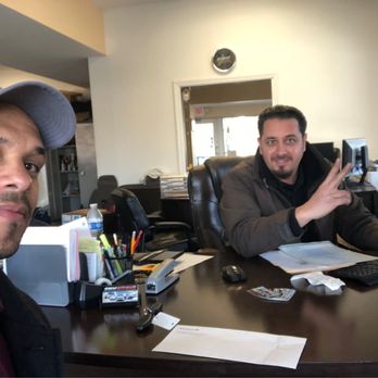 Sky Auto Sales - Wrapping up the paperwork with Joe - Car Dealers Near Me - Detroit, Michigan Sky Auto Sales - Wrapping up the paperwork with Joe - Car Dealers Near Me - Detroit, Michigan