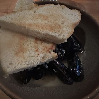 Tinderbox Kitchen - Steamed mussels covered by a lot of bread. Don't think this was a focaccia crostini, but more like a sourdough... - New American Near Me - Flagstaff, Arizona Tinderbox Kitchen - Steamed mussels covered by a lot of bread. Don't think this was a focaccia crostini, but more like a sourdough... - New American Near Me - Flagstaff, Arizona