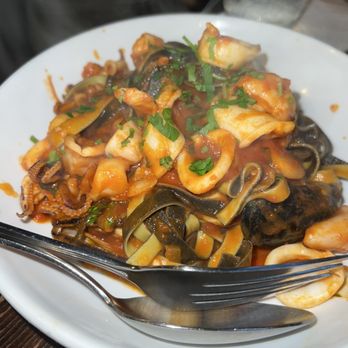 Rubirosa - Black and white tagliatelle - Italian Near Me - New York, New York Rubirosa - Black and white tagliatelle - Italian Near Me - New York, New York