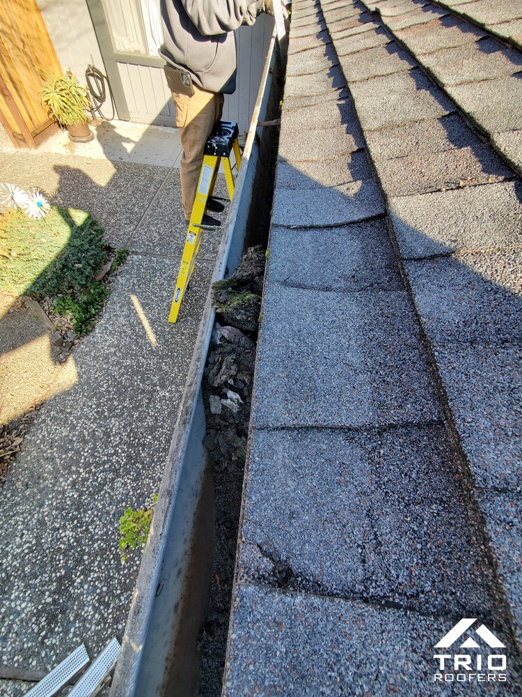 Slide of Trio Roofers