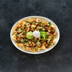 Yard House - Enjoy a variety of appetizers, like our Chicken Nachos, while watching your favorite sports games.