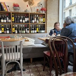 Les Petites Bouchées - Love the wine display on the wall.  Utilized the tiny space beautifully!
