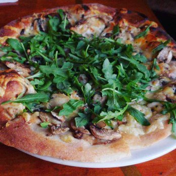 Jupiter - Mushroom style pizza with arugula - Pizza Near Me - Berkeley, California Jupiter - Mushroom style pizza with arugula - Pizza Near Me - Berkeley, California