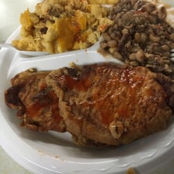 Ricky & Roy's Catering - Fried pork chops, mac & cheese  with black eye peas.