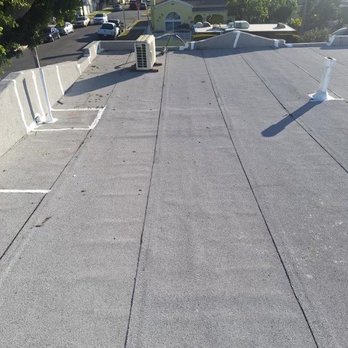 Bridgeline Construction - a view of a flat roof - General Contractors Near Me