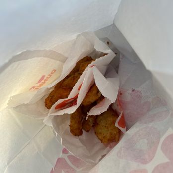 Dunkin' - a close up of a sandwich in a paper bag - Donuts Near Me - Germantown, Tennessee Dunkin' - a close up of a sandwich in a paper bag - Donuts Near Me - Germantown, Tennessee