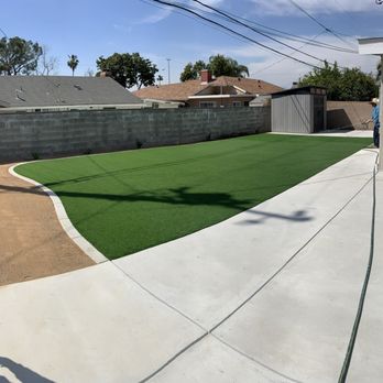 JGS Synthetic Grass - Finishing touches and clean up. They even went the extra mile to clean the debris and dust from the side yard and patio. - Artificial Turf Near Me