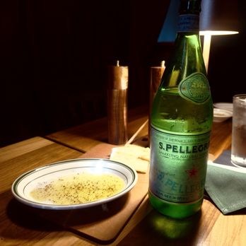Carletti's - Complimentary bread with olive oil and balsamic. Always add the Pellegrino. - Italian Near Me - Oklahoma City, Oklahoma