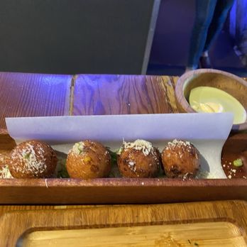 Lechon - White Corn and Cheese Fritters - Tapas Bars Near Me - Portland, Oregon Lechon - White Corn and Cheese Fritters - Tapas Bars Near Me - Portland, Oregon