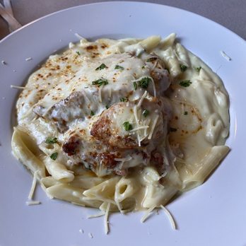 Strings Italian Cafe - Stuffed Chicken al Forno - Italian Near Me - Visalia, California Strings Italian Cafe - Stuffed Chicken al Forno - Italian Near Me - Visalia, California